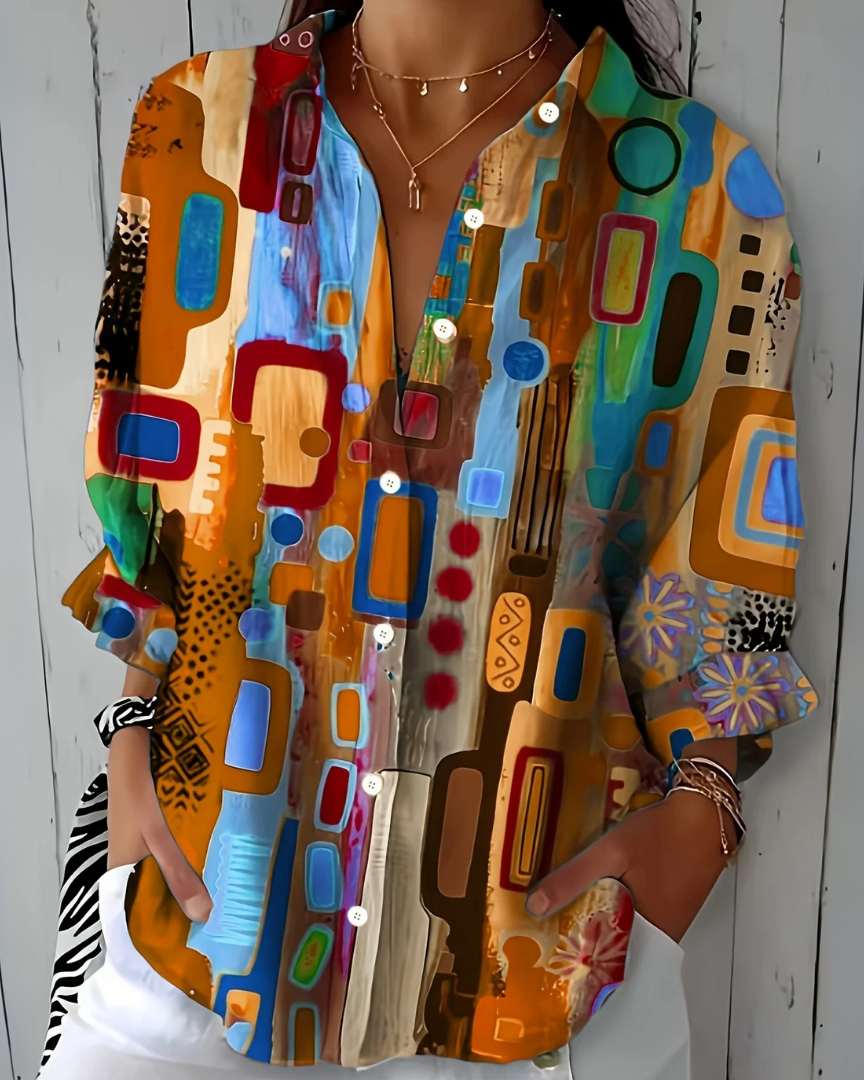 Blouse : Catalina | Vibrant Artistic Button-Up Blouse in Orange van DUUWE