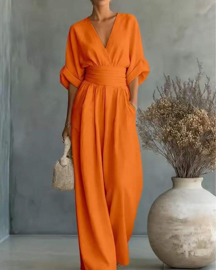 : Risel - Jumpsuit to Feel Comfortable and Polished on Your Day. in Orange van Paper Favor