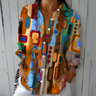 Blouse : Catalina | Vibrant Artistic Button-Up Blouse in Orange van DUUWE