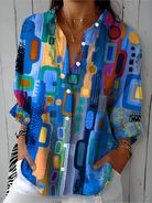 Blouse : Catalina | Vibrant Artistic Button-Up Blouse in Blue van DUUWE