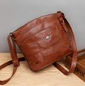 Women's Vintage leather shoulder bag with rich patina and timeless